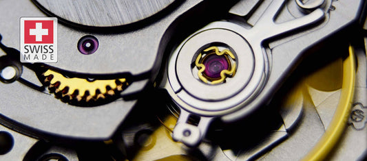 Close-up of a Swiss Made automatic watch movement with ruby jewels and balance wheel